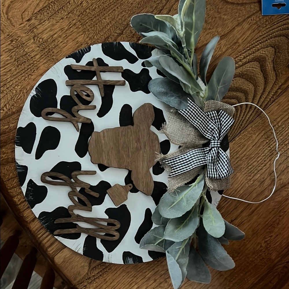 Cow Print Wall Decor with Greenery and Bow